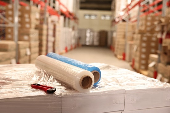 Shrinkwrap on carton with cutting knife